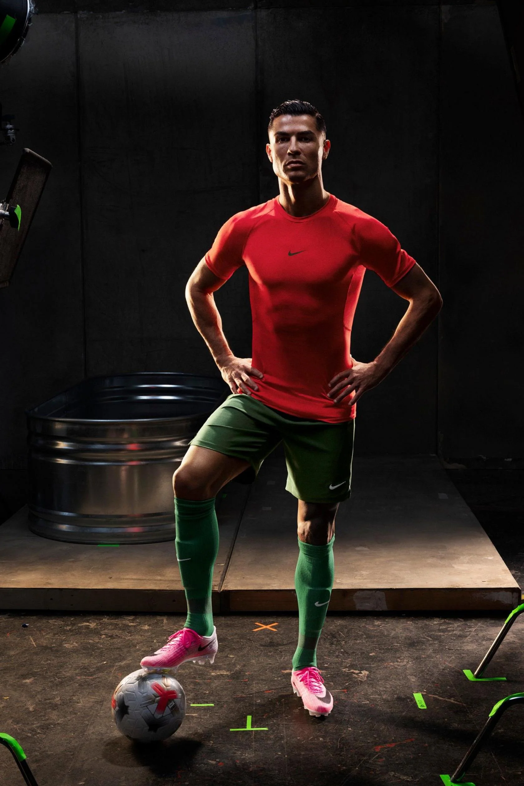 Cristiano Ronaldo starring in Nike's World Cup advert, standing with hands on his hips and one foot on a football